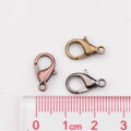 Sada bižutérnych zapínaní bez Niklu - delfín 10x6mm 240ks